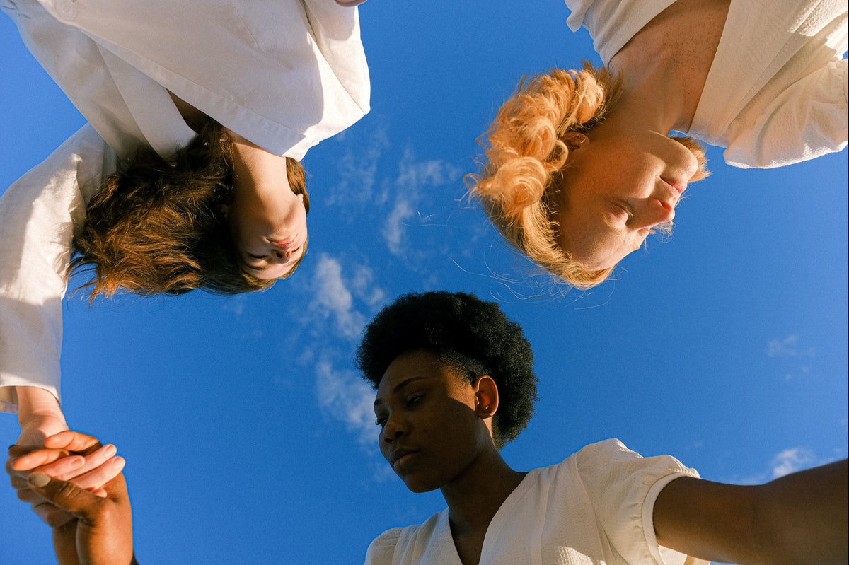 photo-of-women-holding-each-other-s-hands-4672553